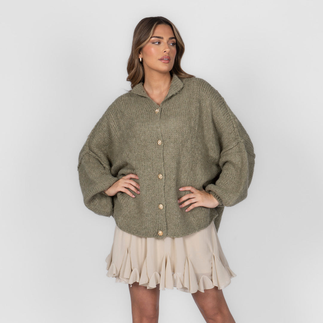 Oversized megztas kardiganas su sagomis