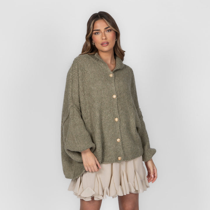 Oversized megztas kardiganas su sagomis