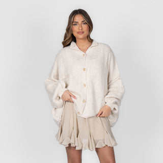 Oversized megztas kardiganas su sagomis