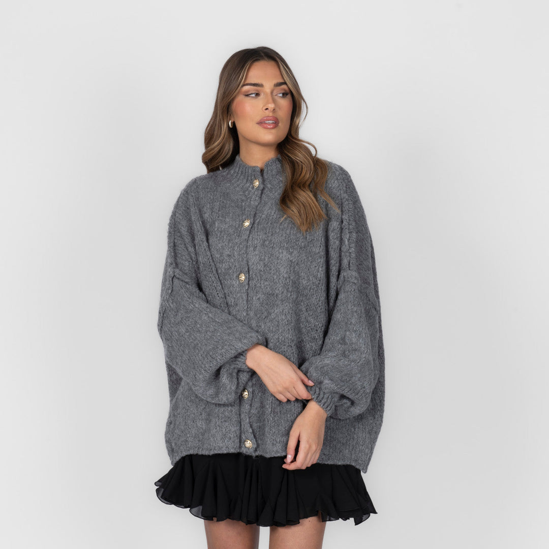 Oversized megztas kardiganas su sagomis