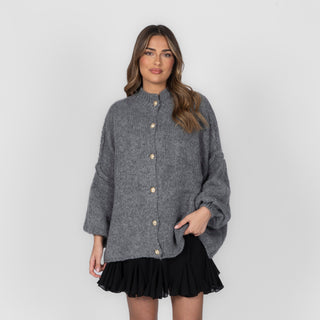 Oversized megztas kardiganas su sagomis