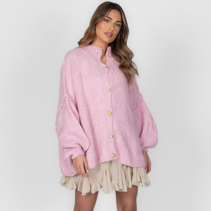 Oversized megztas kardiganas su sagomis