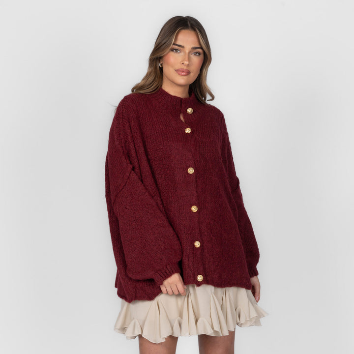 Oversized megztas kardiganas su sagomis
