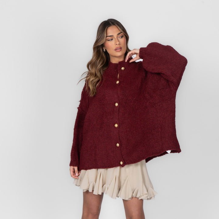 Oversized megztas kardiganas su sagomis