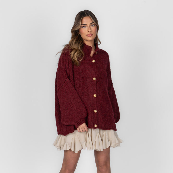 Oversized megztas kardiganas su sagomis