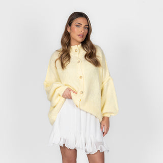 Oversized megztas kardiganas su sagomis
