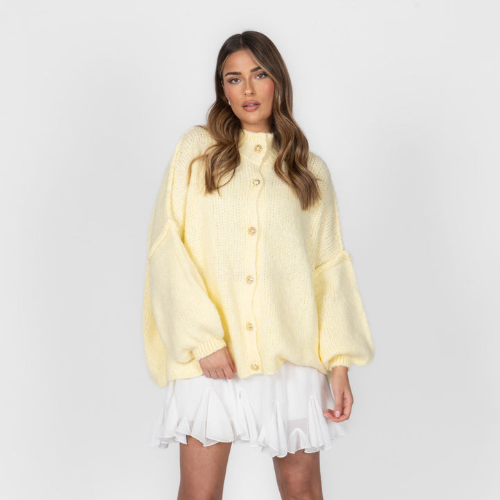 Oversized megztas kardiganas su sagomis