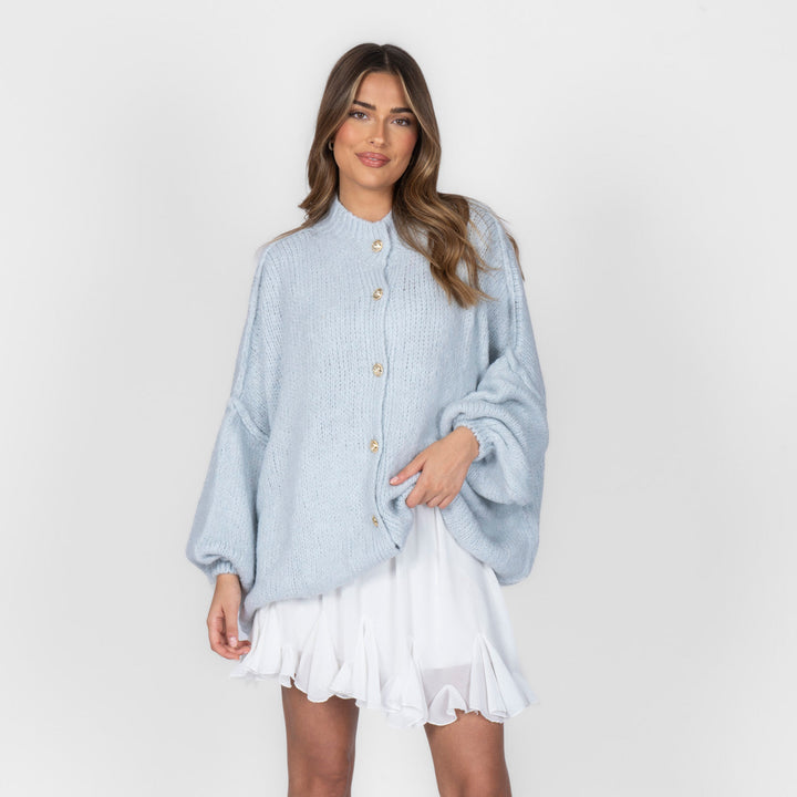 Oversized megztas kardiganas su sagomis