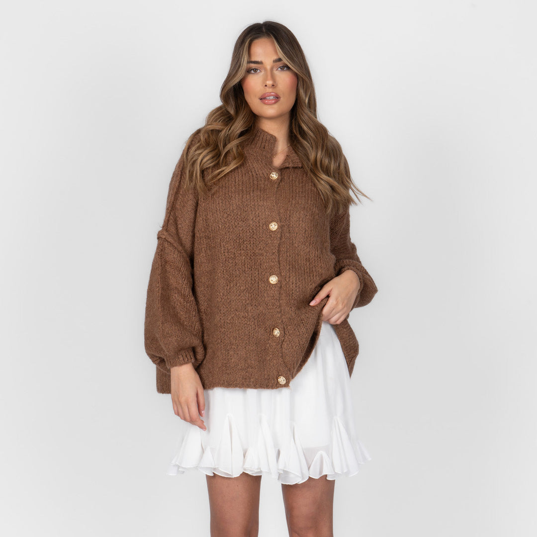 Oversized megztas kardiganas su sagomis