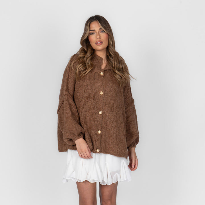 Oversized megztas kardiganas su sagomis