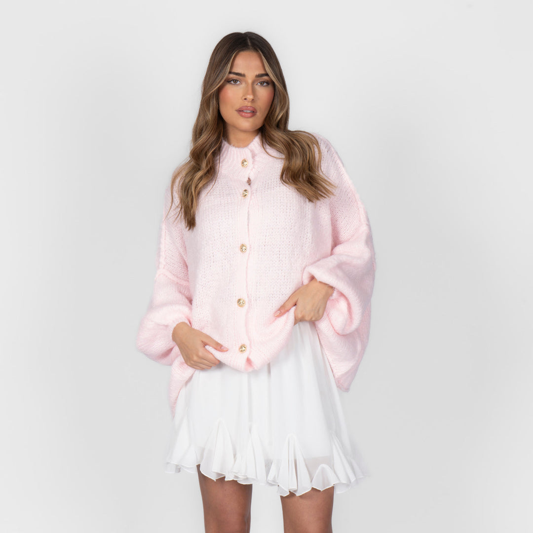Oversized megztas kardiganas su sagomis