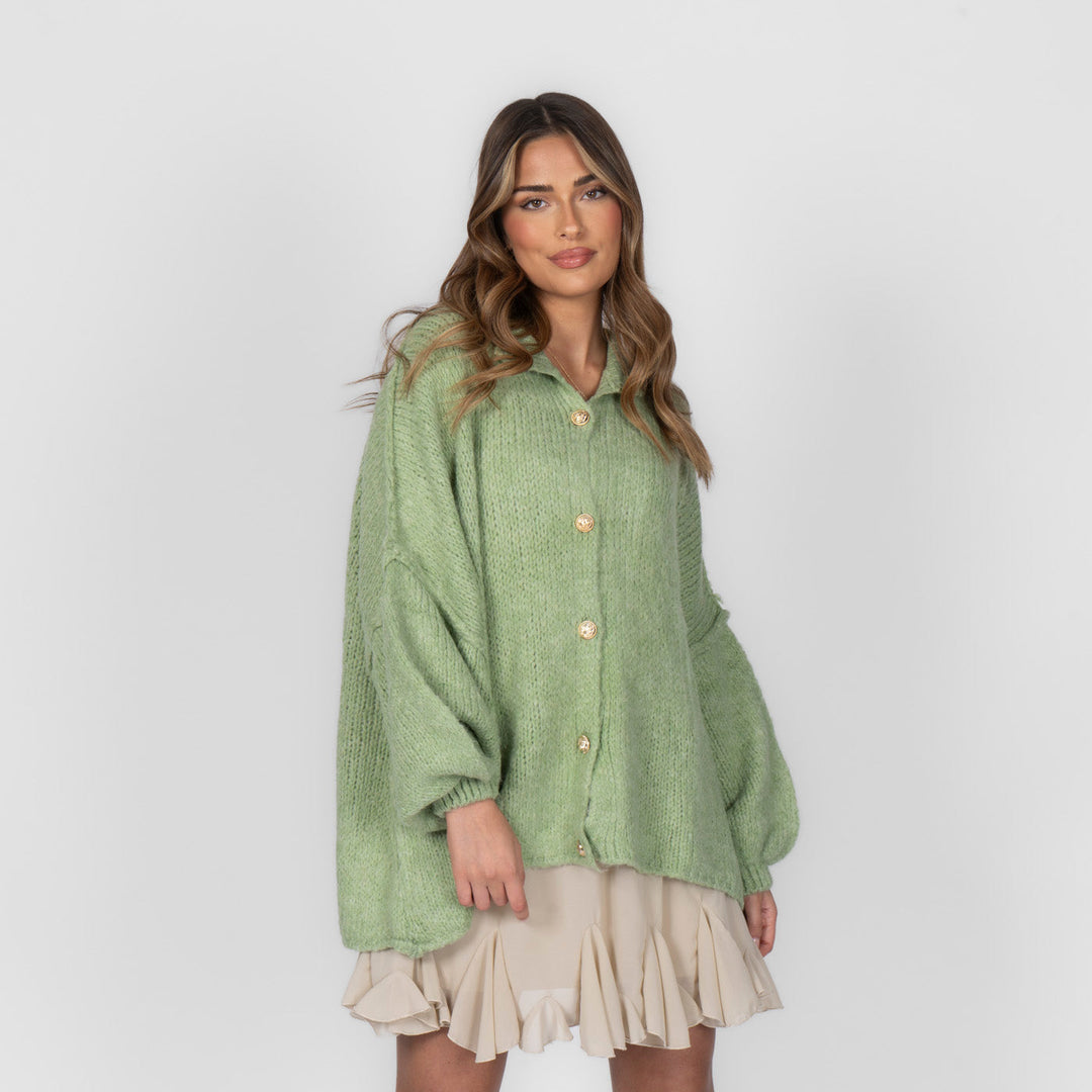 Oversized megztas kardiganas su sagomis