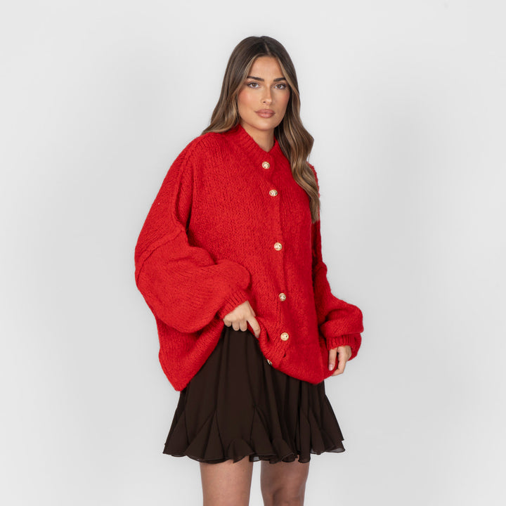 Oversized megztas kardiganas su sagomis