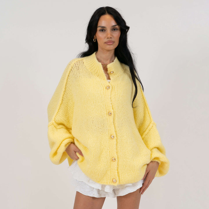 Oversized megztas kardiganas su sagomis