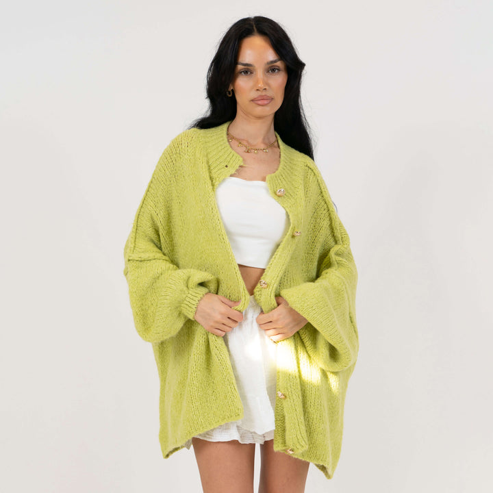 Oversized megztas kardiganas su sagomis