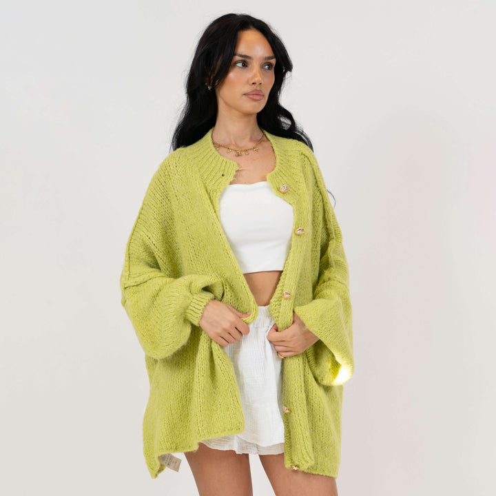 Oversized megztas kardiganas su sagomis