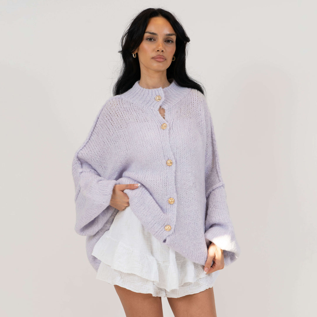 Oversized megztas kardiganas su sagomis