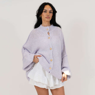 Oversized megztas kardiganas su sagomis