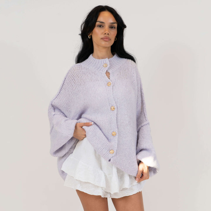 Oversized megztas kardiganas su sagomis