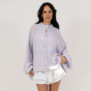 Oversized megztas kardiganas su sagomis