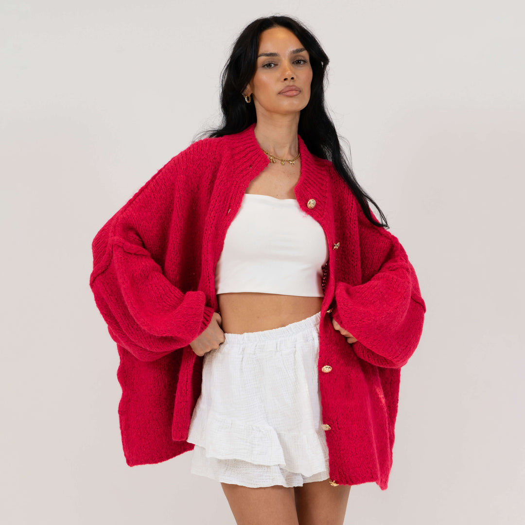 Oversized megztas kardiganas su sagomis