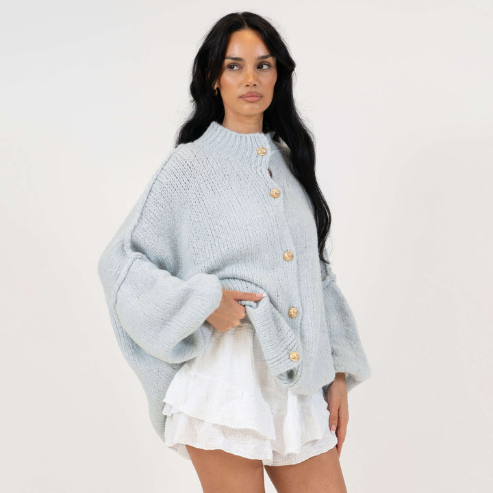 Oversized megztas kardiganas su sagomis