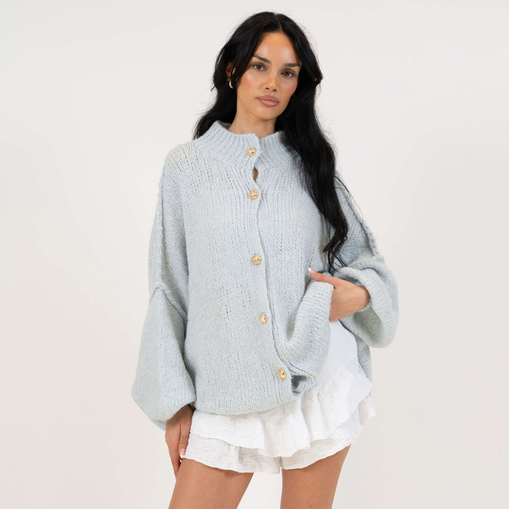 Oversized megztas kardiganas su sagomis