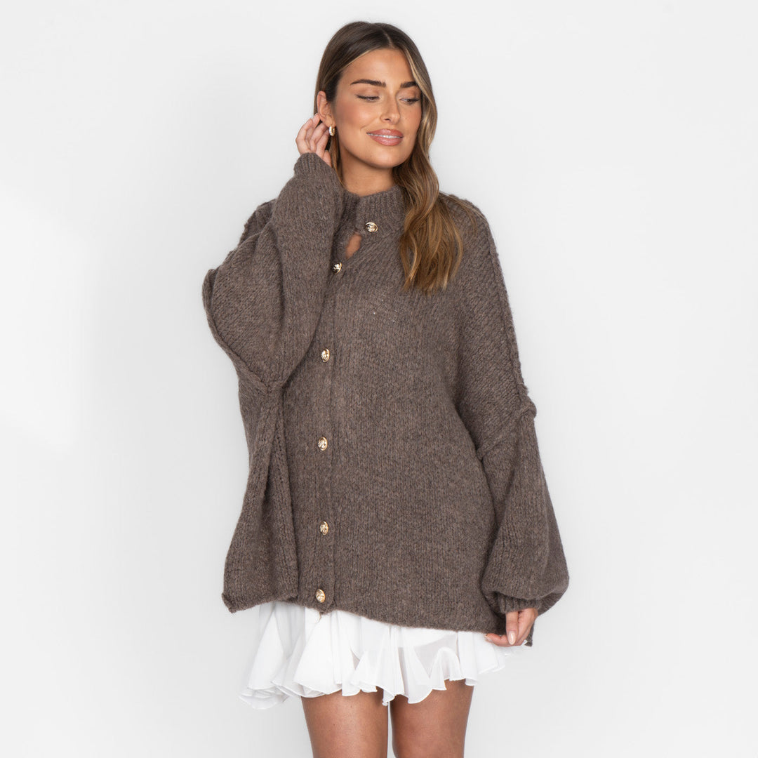 Oversized megztas kardiganas su sagomis