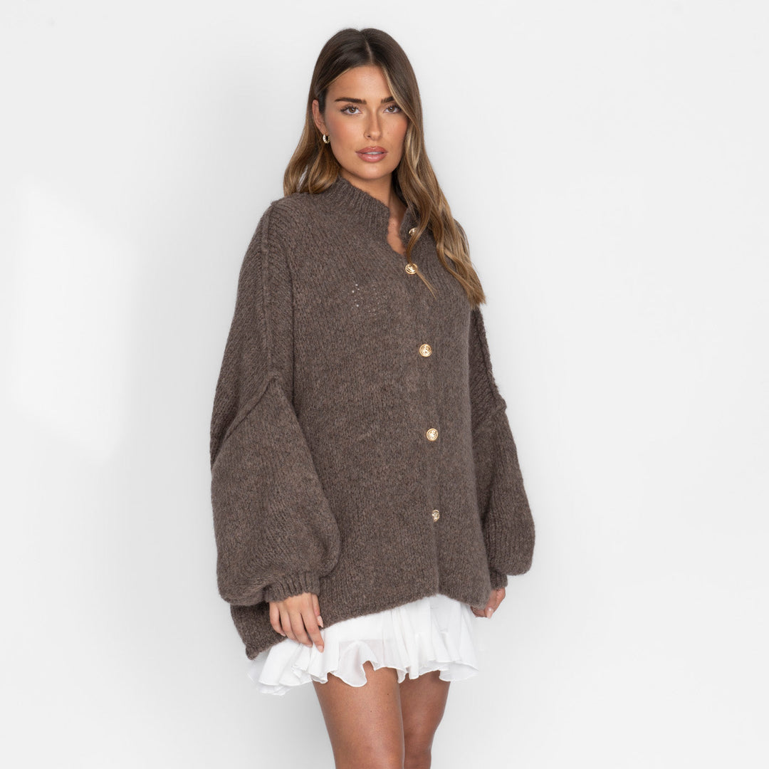 Oversized megztas kardiganas su sagomis