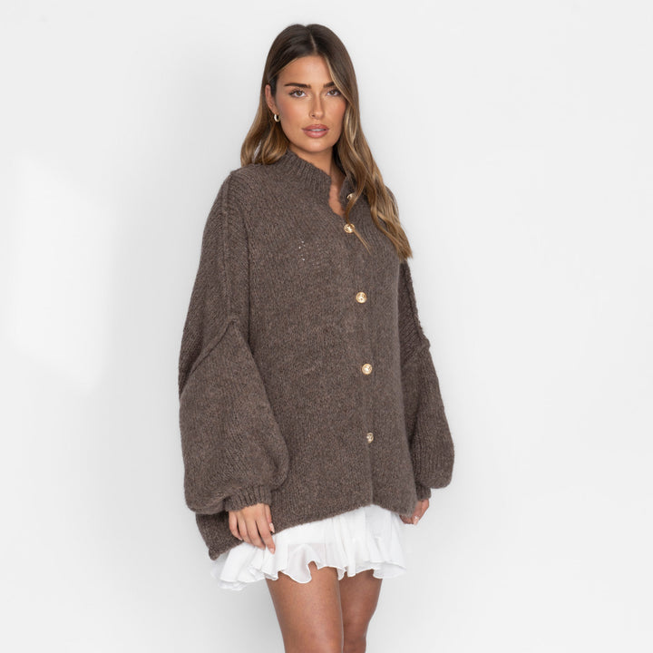 Oversized megztas kardiganas su sagomis