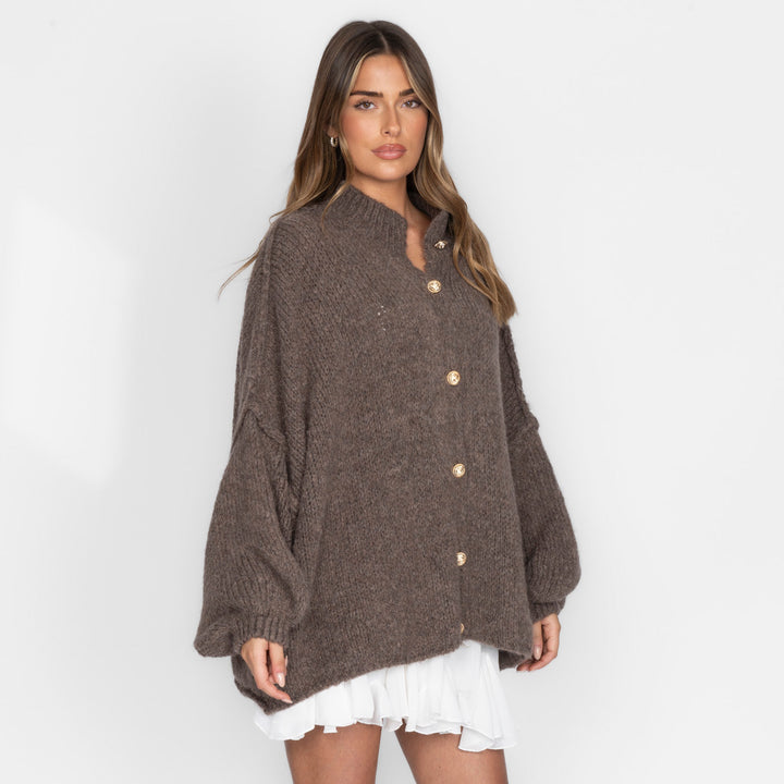 Oversized megztas kardiganas su sagomis