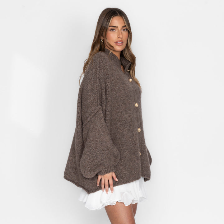 Oversized megztas kardiganas su sagomis
