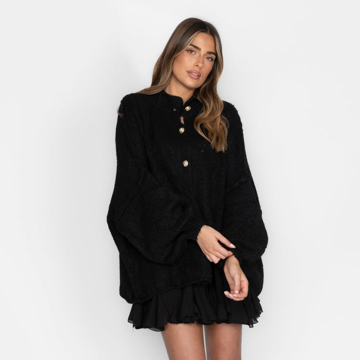 Oversized megztas kardiganas su sagomis