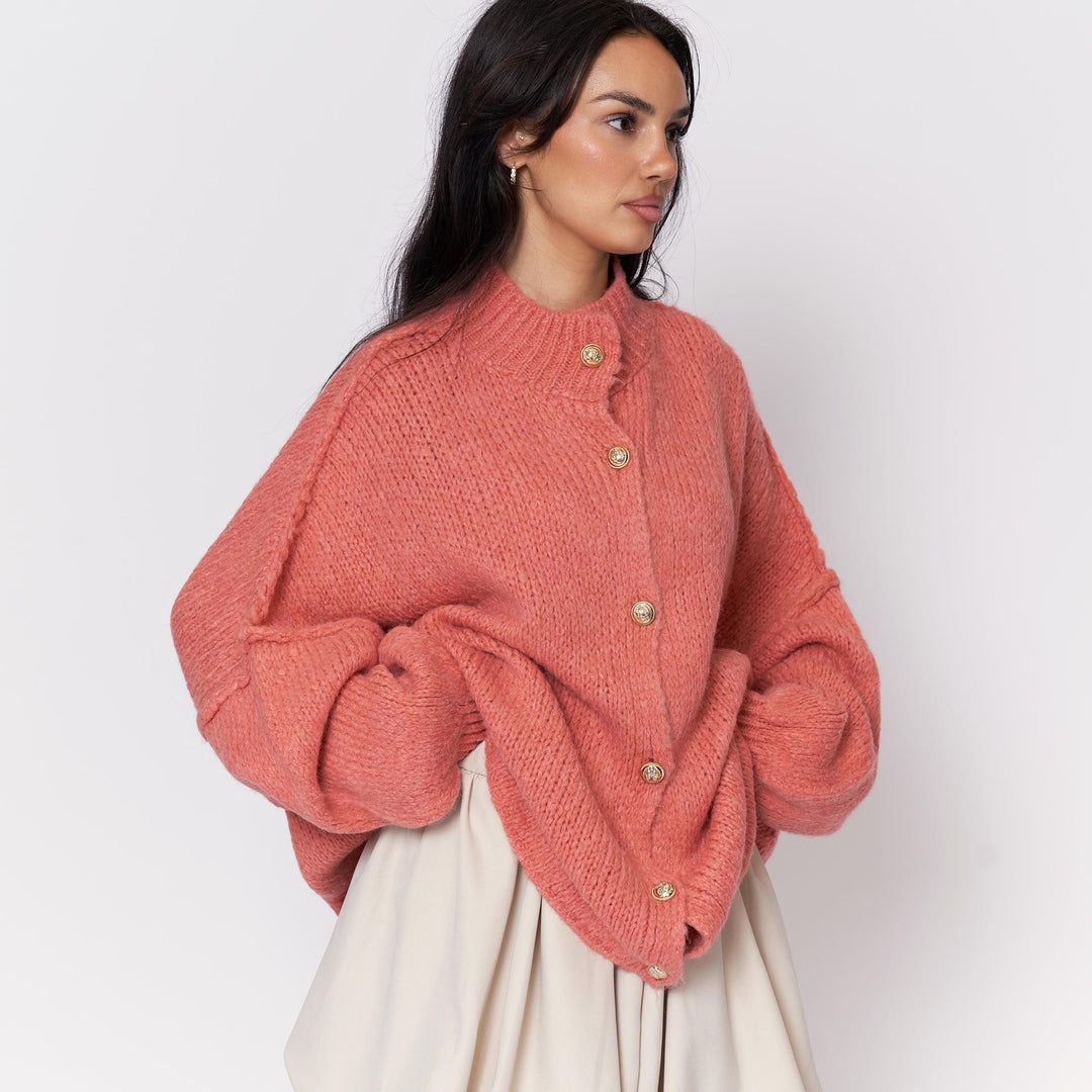 Oversized megztas kardiganas su sagomis
