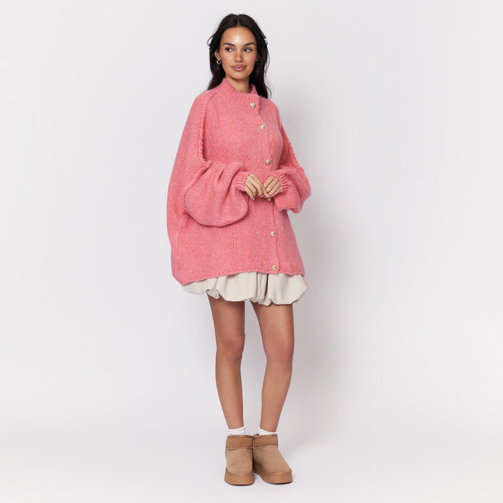Oversized megztas kardiganas su sagomis