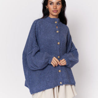 Oversized megztas kardiganas su sagomis