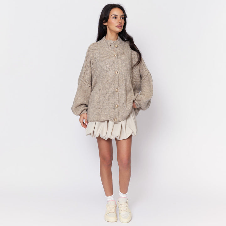 Oversized megztas kardiganas su sagomis