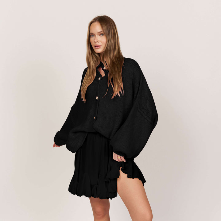 Oversized megztas kardiganas su sagomis