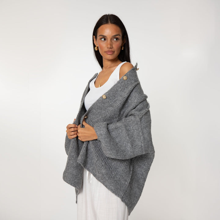 Oversized megztas kardiganas su sagomis