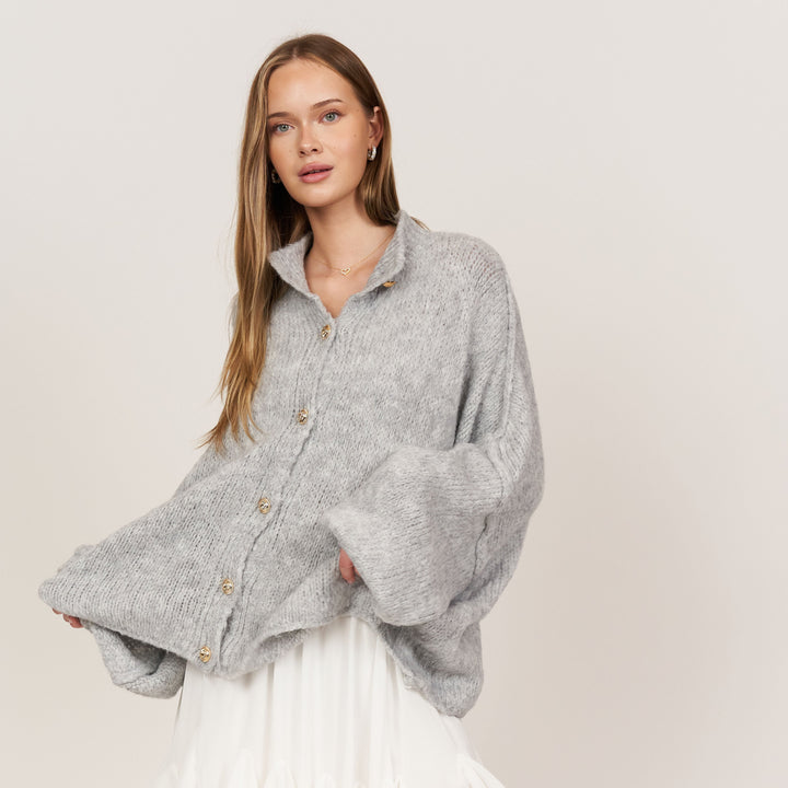 Oversized megztas kardiganas su sagomis